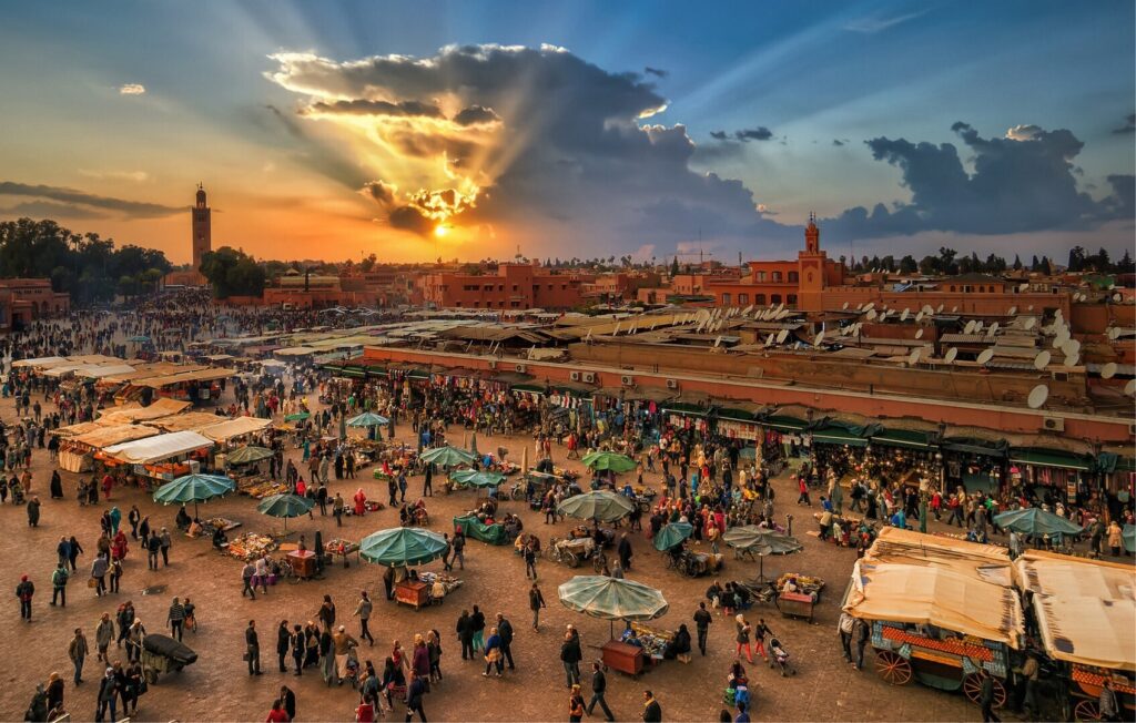 Vibrant scene in the heart of Marrakech, featuring bustling souks, historic architecture, and lively street life.Weather for Morocco in December