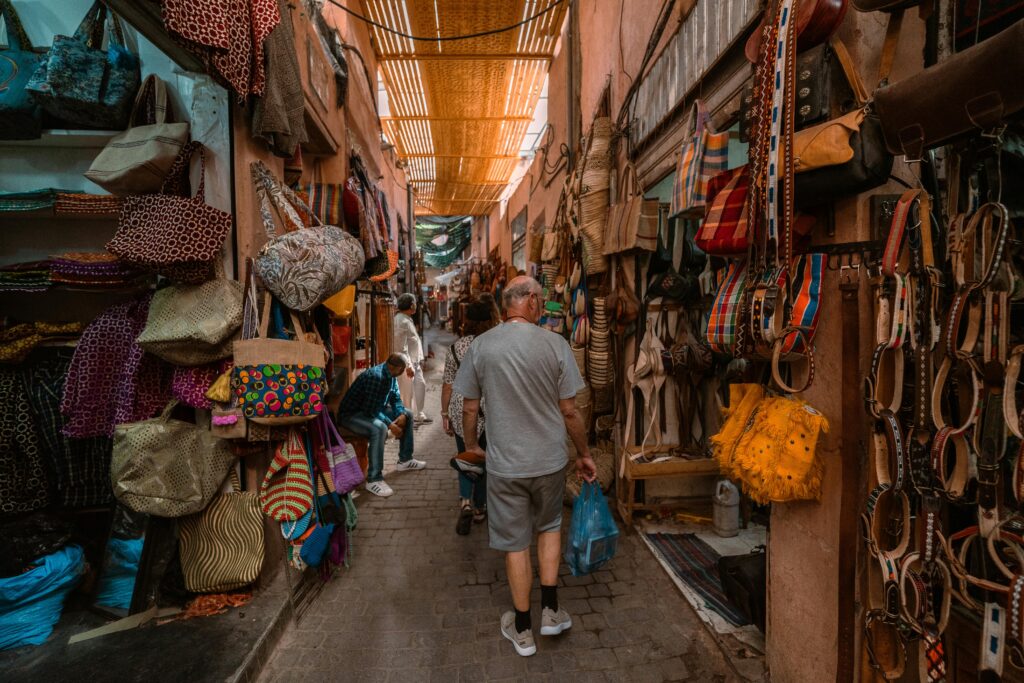 Vibrant Moroccan markets stall with colorful spices and textiles showcasing the bustling atmosphere of Moroccan souks.