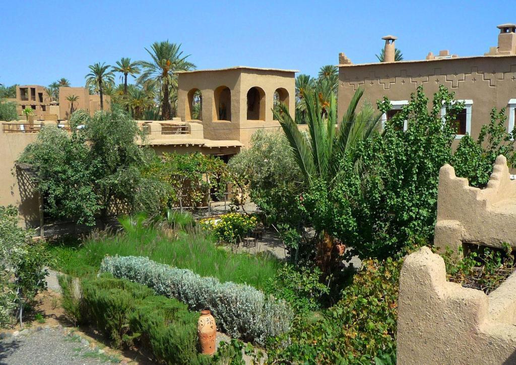 Beautiful view of Les Jardins de Skoura, a luxury eco-lodge surrounded by lush gardens in the Dades Valley