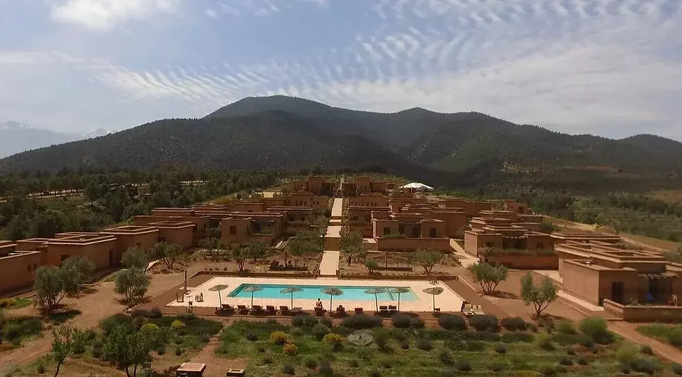 Sustainable eco-lodge nestled in nature, featuring eco-friendly architecture and natural surroundings