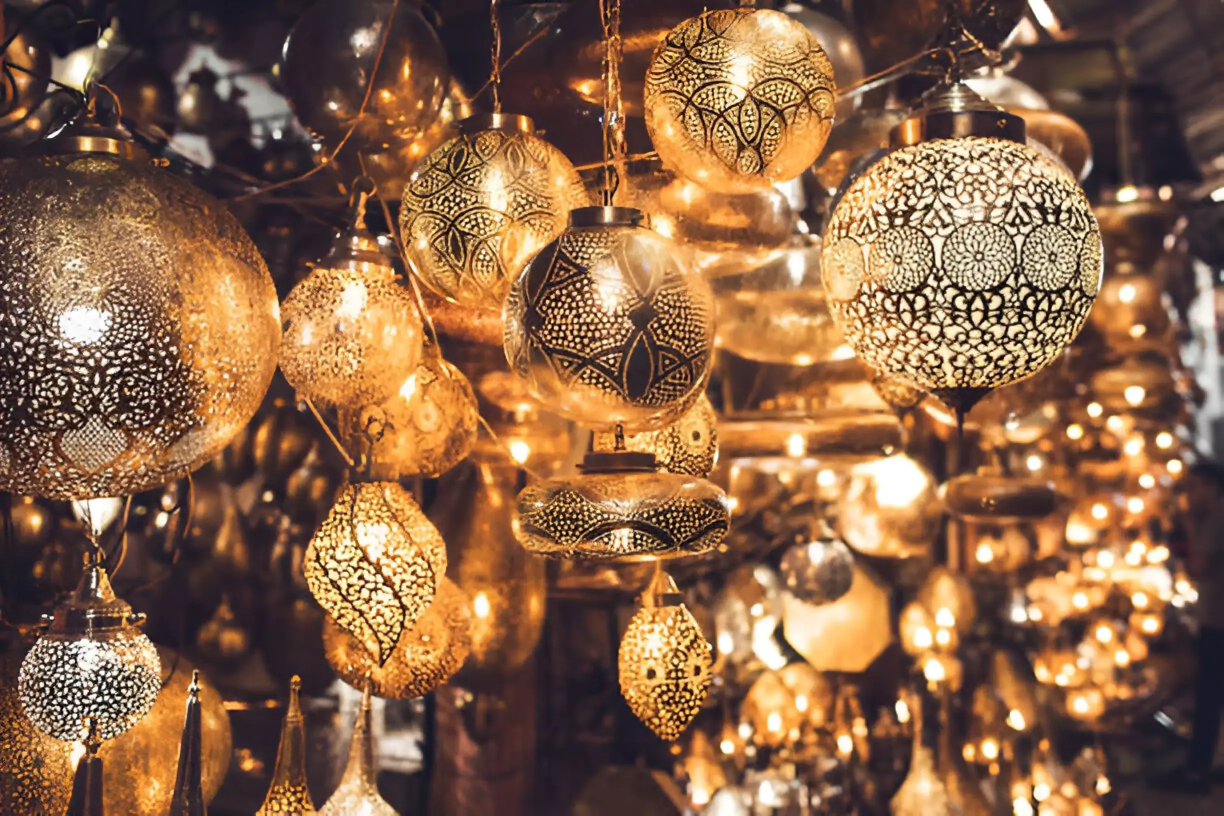 Moroccan lamp glowing with intricate patterns of light